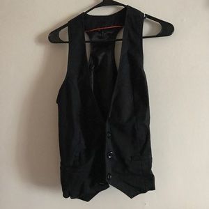 Black fitted vest